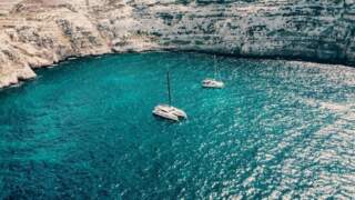 Paseos en catamarán por Santorini 2026 ❤️. Reservar un catamarán.